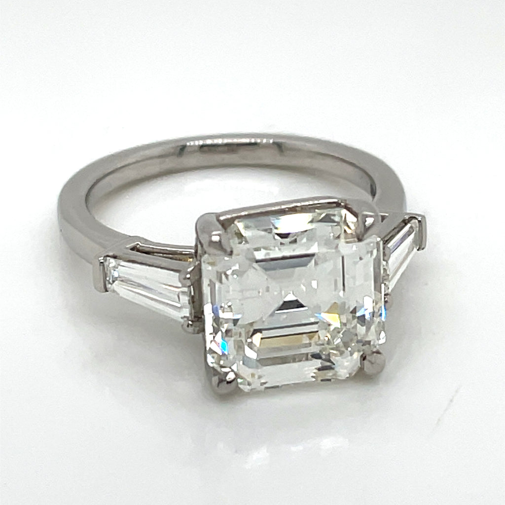 Solitaire diamond ring with Square Emerald cut centre 5.07