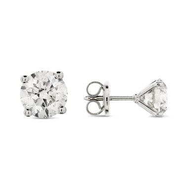 A pair of diamond Stud Earrings 1.07ct G SI1-SI2 WGI 18K white gold